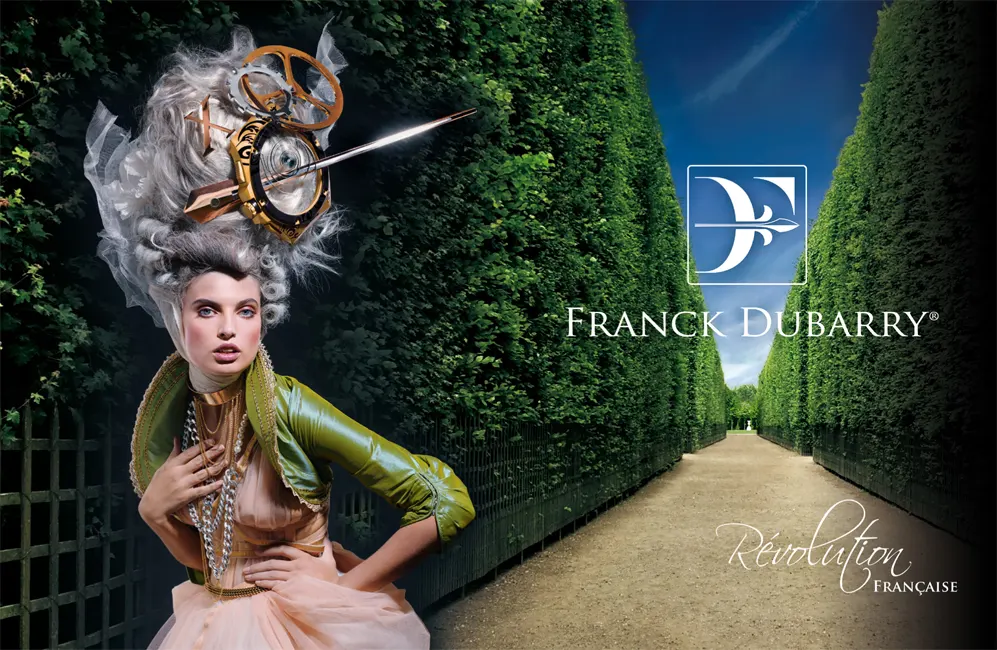 Franck Dubarry Révolution Française campaign showing model in baroque period costume with clockwork headpiece in formal French garden with manicured hedges